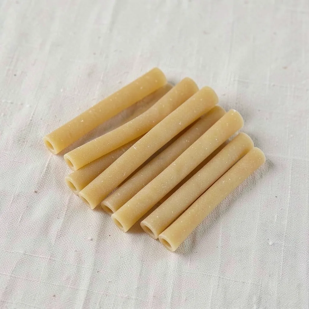 Pasta al ceppo, uncooked, on linen